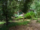 Start of trail, walk in front of the bungalows