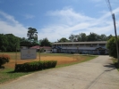 Past the school and to the main road Past the school and to the main road