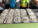 Preparing foodboxes for workers and victims
