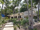 New house on hill at western end of the beach